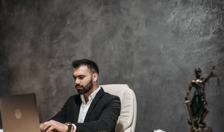 Lawyer working on a laptop in an office